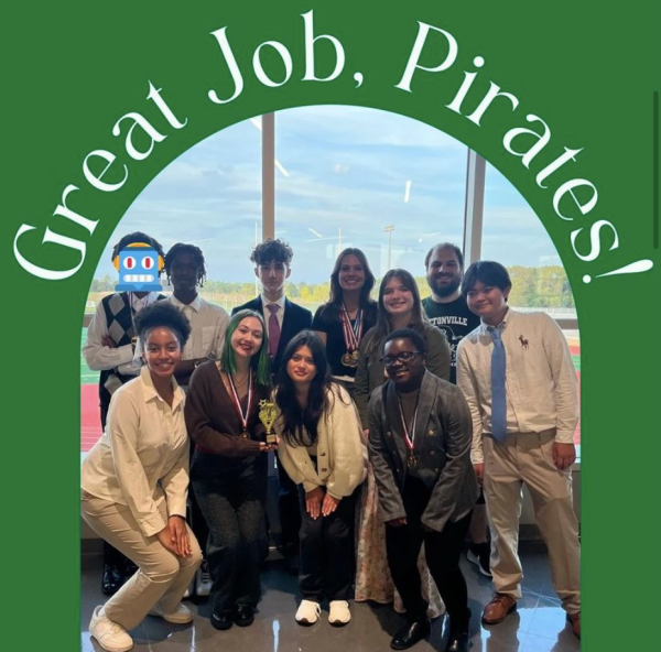 Members of the Pattonville Speech and Debate team celebrate their success with coach Mr. Justin Levy after their tournament in Columbia, MO on Oct. 11 and 12. 